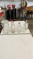 Oil lamp base, glass bottles, glass jar with lid