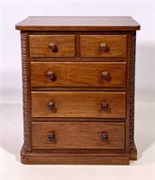 Miniature chest, solid end, mahogany, spool