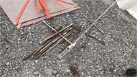 4- Tire Wrenches and Tent Stakes