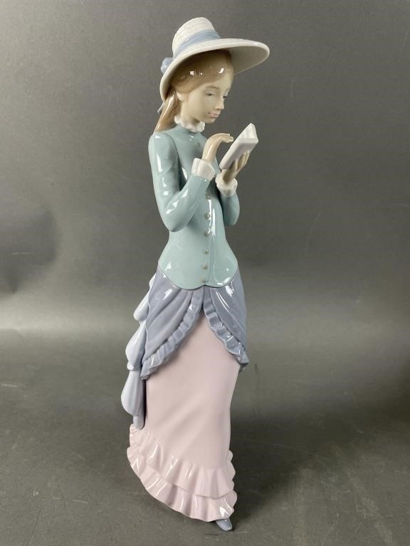 Lladro "Reading” Porcelain Figurine