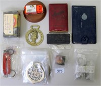 Various items includes baton/handcuff key