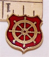 GOLD/BRASS PIN SET WITH SHIP'S WHEEL IN RED ENAMEL