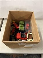 Entire box of assorted toy cars and planes