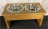 C6)  elevated dog dishes, one for water, one for