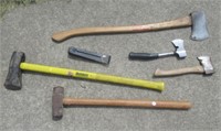 Group of hand tools that includes axes, sledge