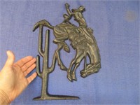 cast iron cowboy on horse plaque 16in tall (heavy)