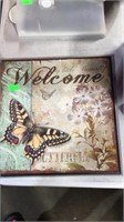 Welcome butterfly sign