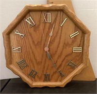 Signed Les Howard octagon oak wall clock