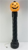 Plug in light up plastic punpkin cadlestick.