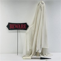 Outside Halloween decorations. Ghost. Beware