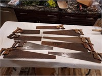 Vintage hand saws with wood handles