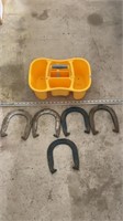 Plastic tray and horse shoes