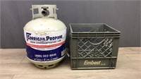 Empty Propane Tank In Embest Milk Crate