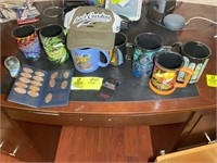 SHELF WITH COFFEE MUGS FROM BUSH GARDENS, AND PENN