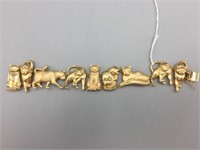 14 karat gold cat bracelet;
