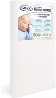 Graco Premium Foam Crib & Toddler Mattress in a