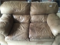 Caramel Colored Leather Love Seat
