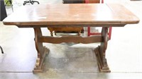 Vintage Oak finish dining table with loss of