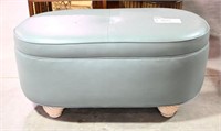 Oval blue vinyl ottoman 21” x 43”