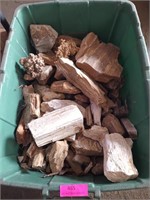 Tub full of petrified wood pieces