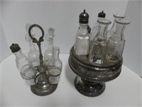 2 - CRUET SETS IN SILVER HOLDERS