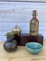 Stoneware bottle and 3 pottery pieces