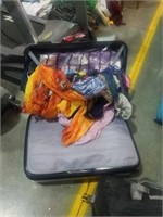 Suitcase of women's clothing and Jewelry