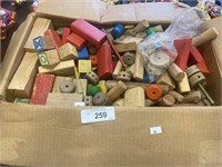Large collection of wooden building blocks.