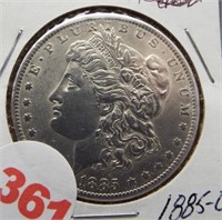 1885-O Morgan silver dollar.