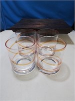 Set a 4 orange swirl high ball glasses