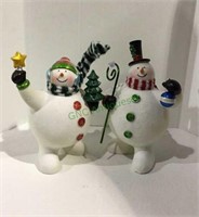 Plaster snowman with fuzzy fabric over form with