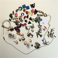 Lot of vintage brooches, necklaces, and bracelets