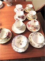 9 fancy cups & saucers