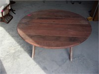 Round wooden table 27x60