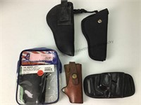 5 holsters, 3 are leather, two nylon see photos,
