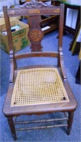 36" Carved Wooden Chair with Caned Seat