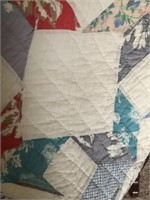 Quilt white with stars and diamonds