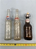 Vintage Pepsi-Cola Bottles and a Grolsch Beer