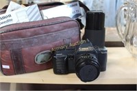 CANON T70 35MM CAMERA AND POUCH