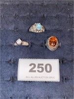 3 sterling rings with stones