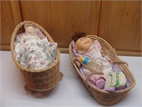 Two Dolls in Cradles