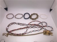 Unmarked 2 necklaces and 5 beaded bracelets