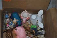 box of pig decoration items