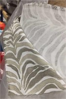 100 yds of tan zebra print fabric