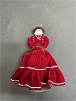 Navahoe Doll with red velvet blouse