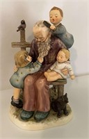 M. J. Hummel Figurine “At Grandpa’s”