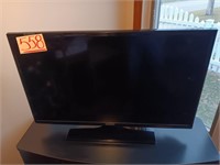 35" Wide Color Flat Screen TV With Remote.