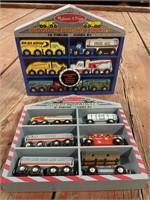 Two Melissa & Doug Wooden Truck and Train Sets