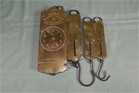 4 antique brass spring scales, largest 11"; as is