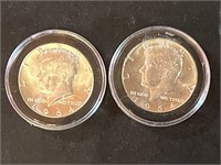 Set of two UC 1964 Kennedy silver half dollars